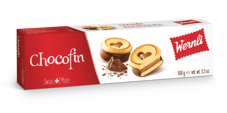 Wernli Chocofin Schokoladenriegel mit Nüssen und Karamell, in goldener Verpackung, sichtbar auf dem Bild