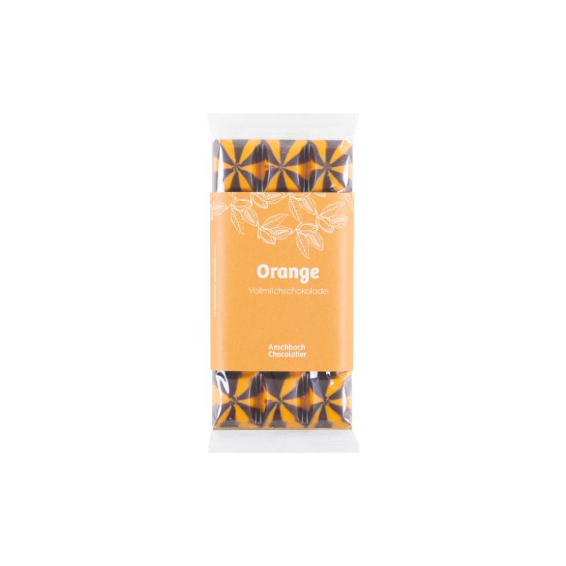 Aeschbach Chocolatier Milchschokolade mit Orangenfüllung, zartes Schokoladenstück mit sichtbarer Orangenfüllung innen