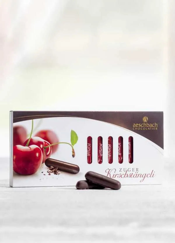 Aeschbach Chocolatier Zuger Kirschstängeli mit Etter Kirsch gefüllt - Chuchichäschtli - Feines aus der Schweiz