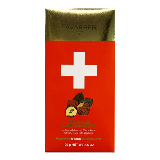Milchschokolade mit Haselnüssen von Chocolat Favarger, 100g, zeigt eine elegante Schokoladentafel mit ganzen Haselnüssen.