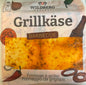 Wildberg Grillkäse Barbecue auf Grillrost, goldbraun gebraten, perfekt für Grillpartys und sommerliche BBQs.